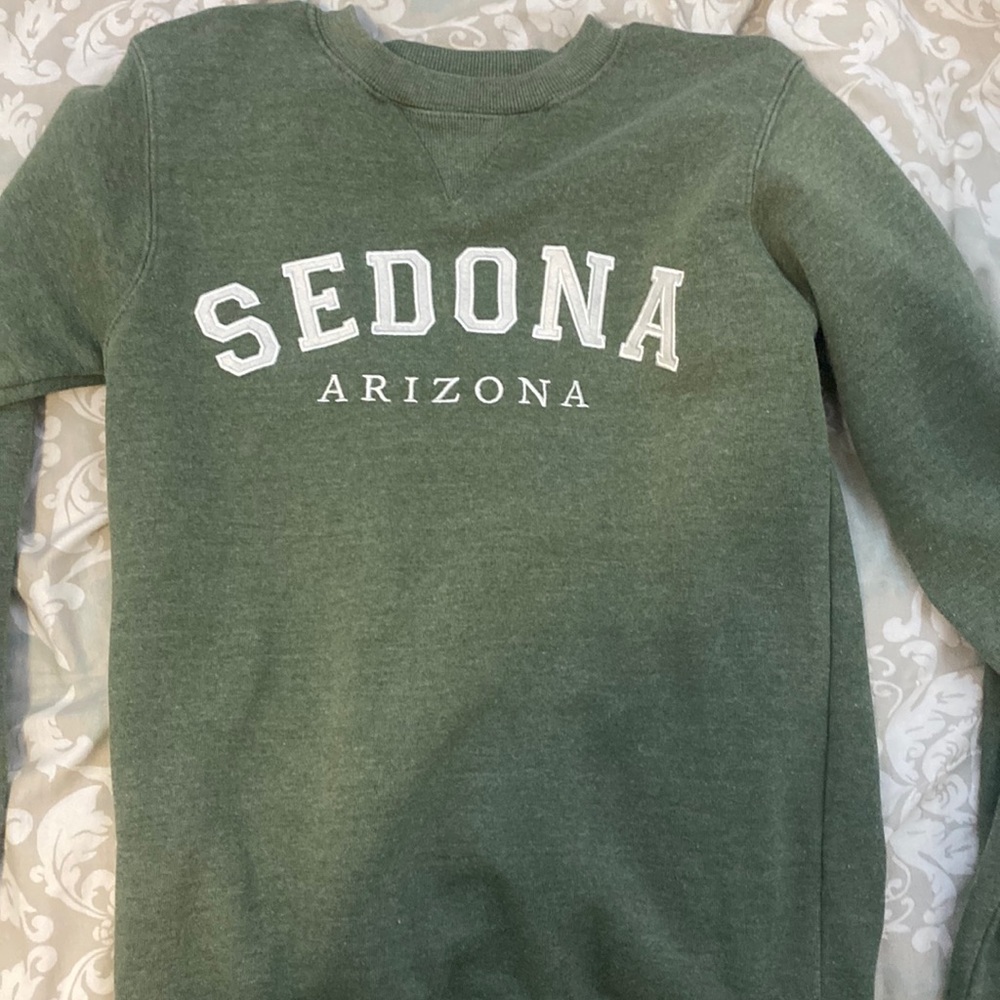 Sage green Sedona Arizona sweatshirt, never worn, fleece lined.